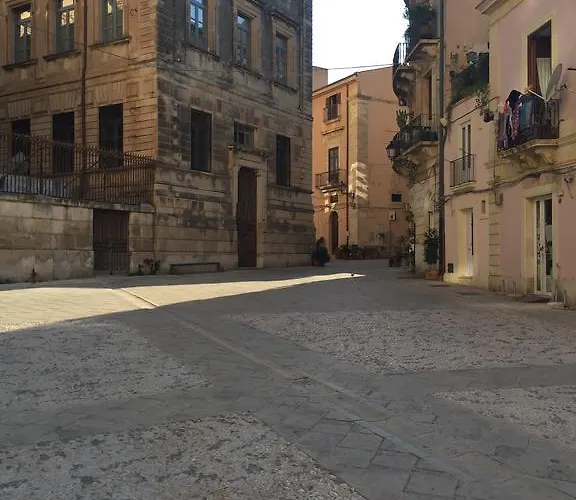 Апартаменты Le C'ortigiane Di Via Mergulensi
