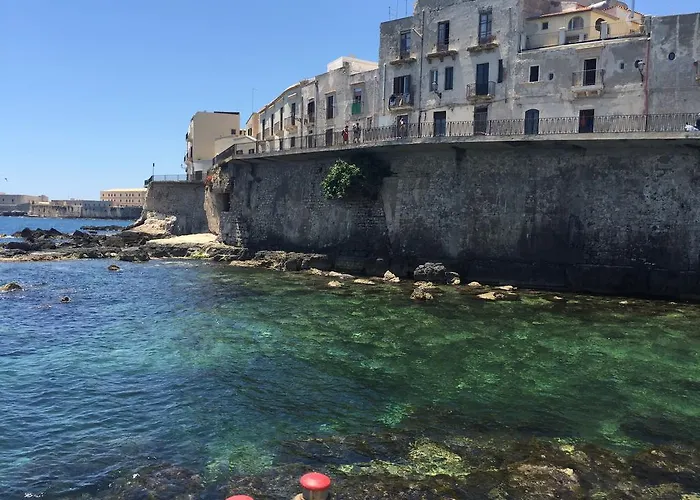 Апартаменты Le C'ortigiane Di Via Mergulensi Сиракузы